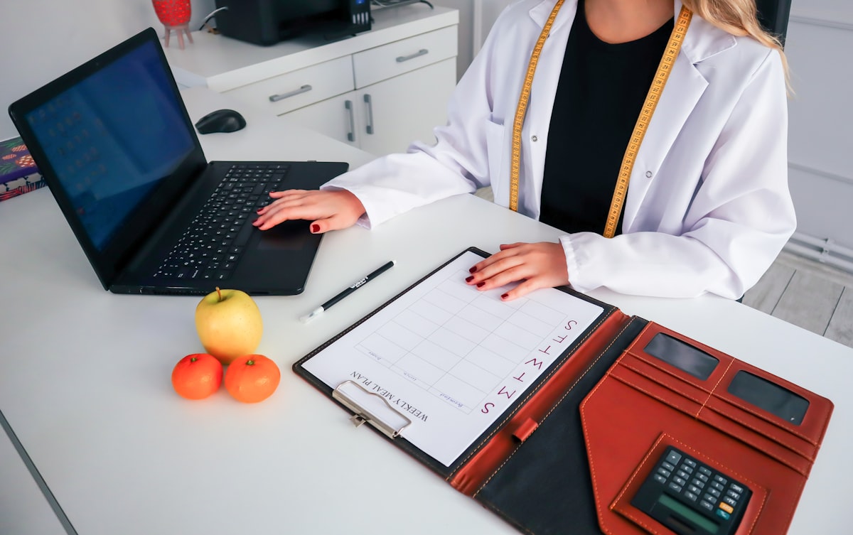 Professional nutritionist consulting with client about personalized dietary guidance